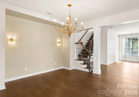 a kitchen with stainless steel appliances kitchen island granite countertop a sink and dishwasher