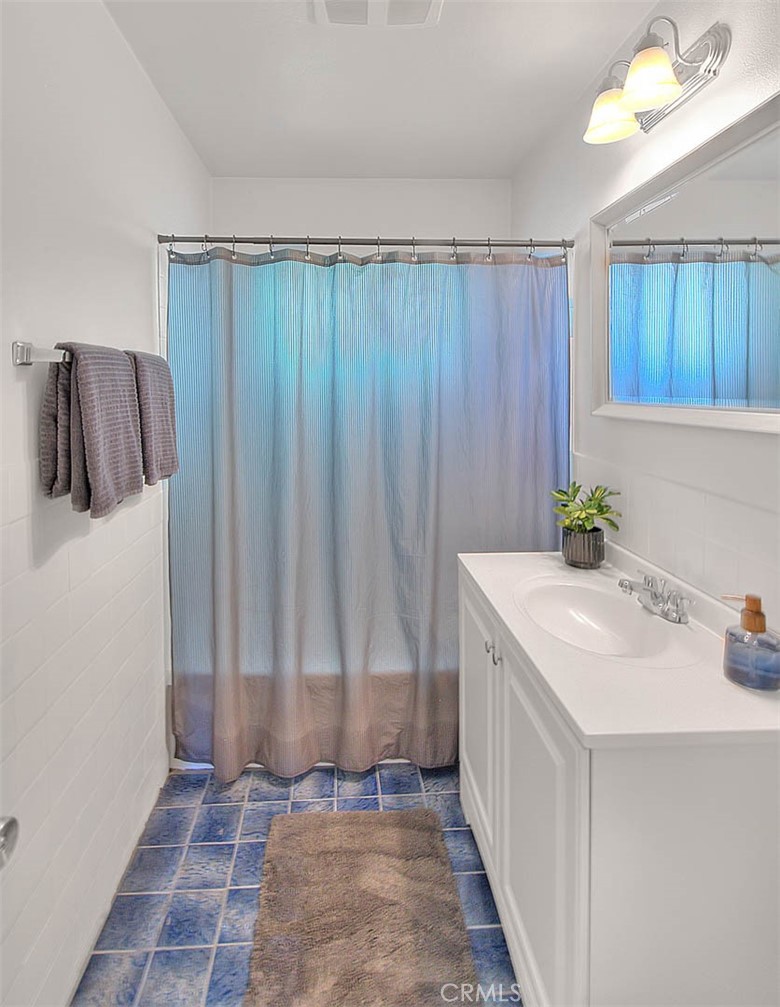 17860 East Laxford Road Azusa, CA 91702 - Photo 15 of 52 a bathroom with a sink and a mirror