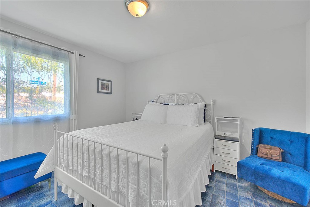 17860 East Laxford Road Azusa, CA 91702 - Photo 17 of 52 a bedroom with a bed and a window