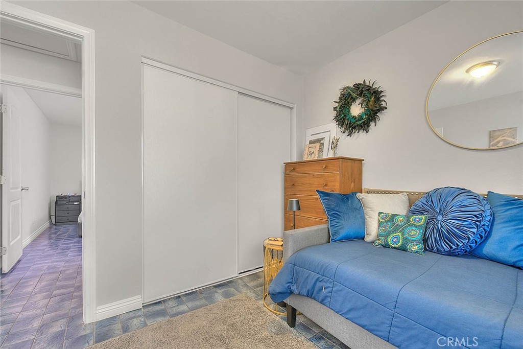 17860 East Laxford Road Azusa, CA 91702 - Photo 21 of 52 a bedroom with a bed and a potted plant