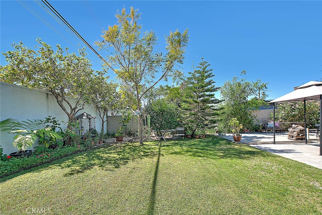17860 East Laxford Road Azusa, CA 91702 - Photo 26 of 52 a garden with trees in front of it