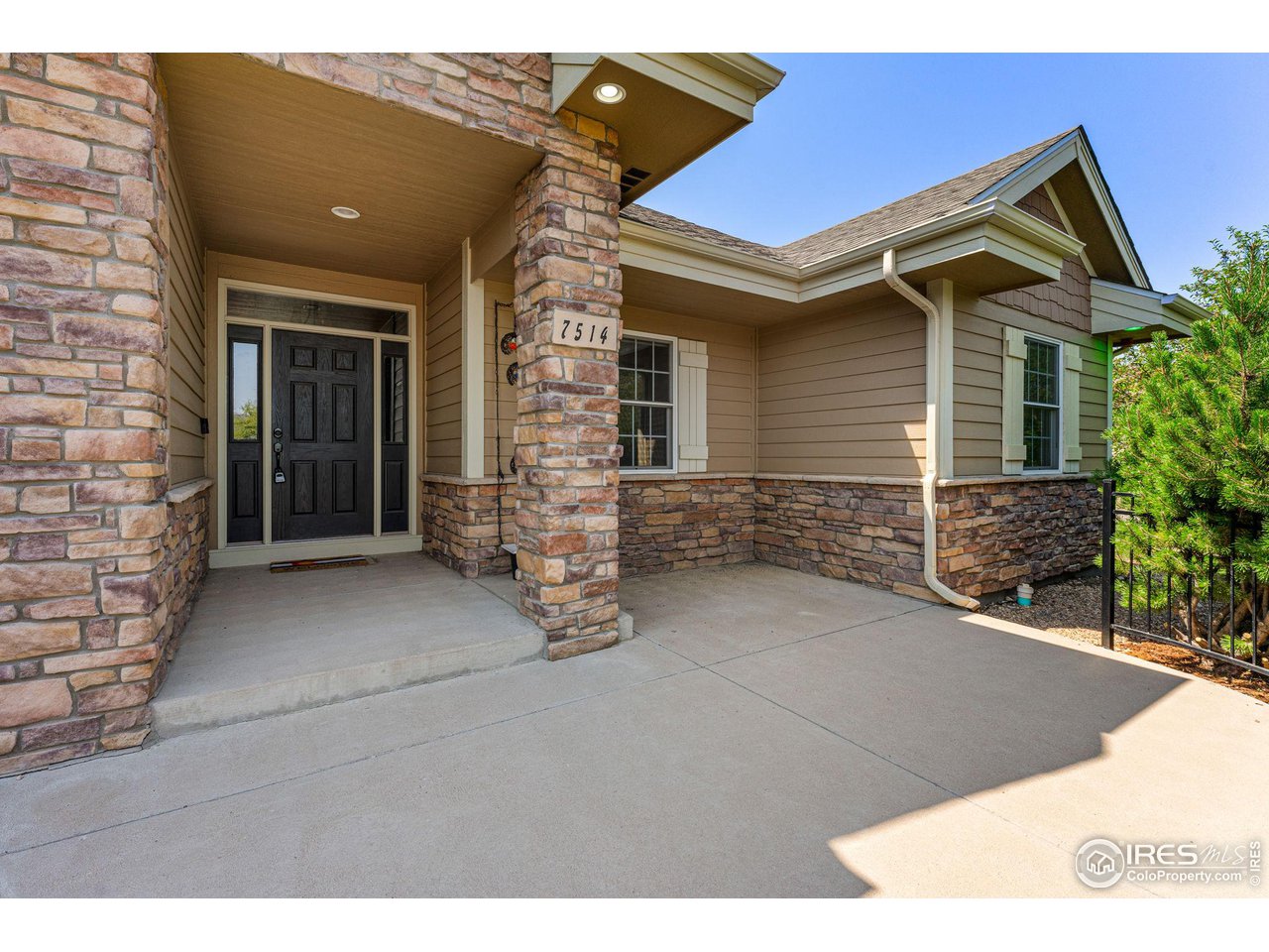 7514 West 19th St Road Greeley, CO 80634 - Photo 2 of 34 Inviting Front Entry Patio