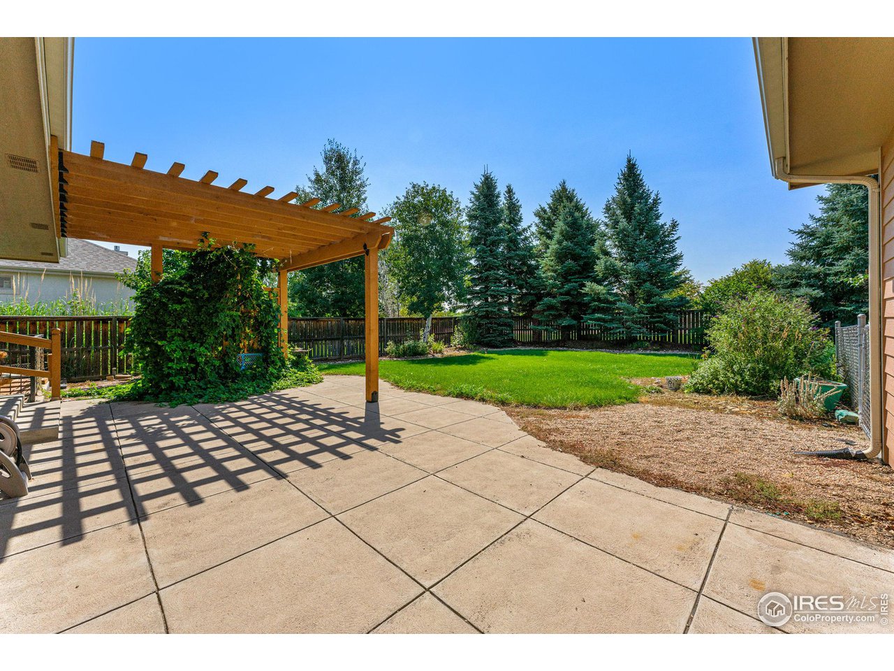 7514 West 19th St Road Greeley, CO 80634 - Photo 30 of 34 Wonderful Back Patio w/ Pergola