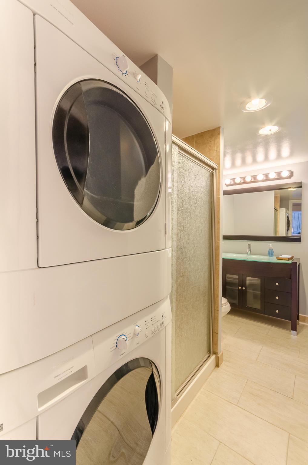 1245 13th Street Northwest, Unit 101 Washington, DC 20005 - Photo 21 of 25 a utility room with dryer and washer