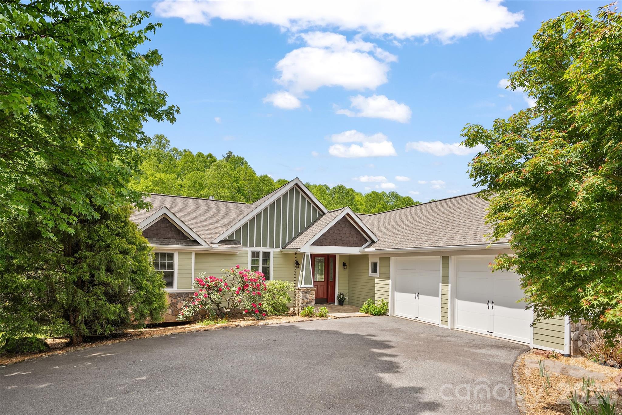 136 Mystic Way Canton, NC 28716 - Photo 3 of 10 front view of a house with a street