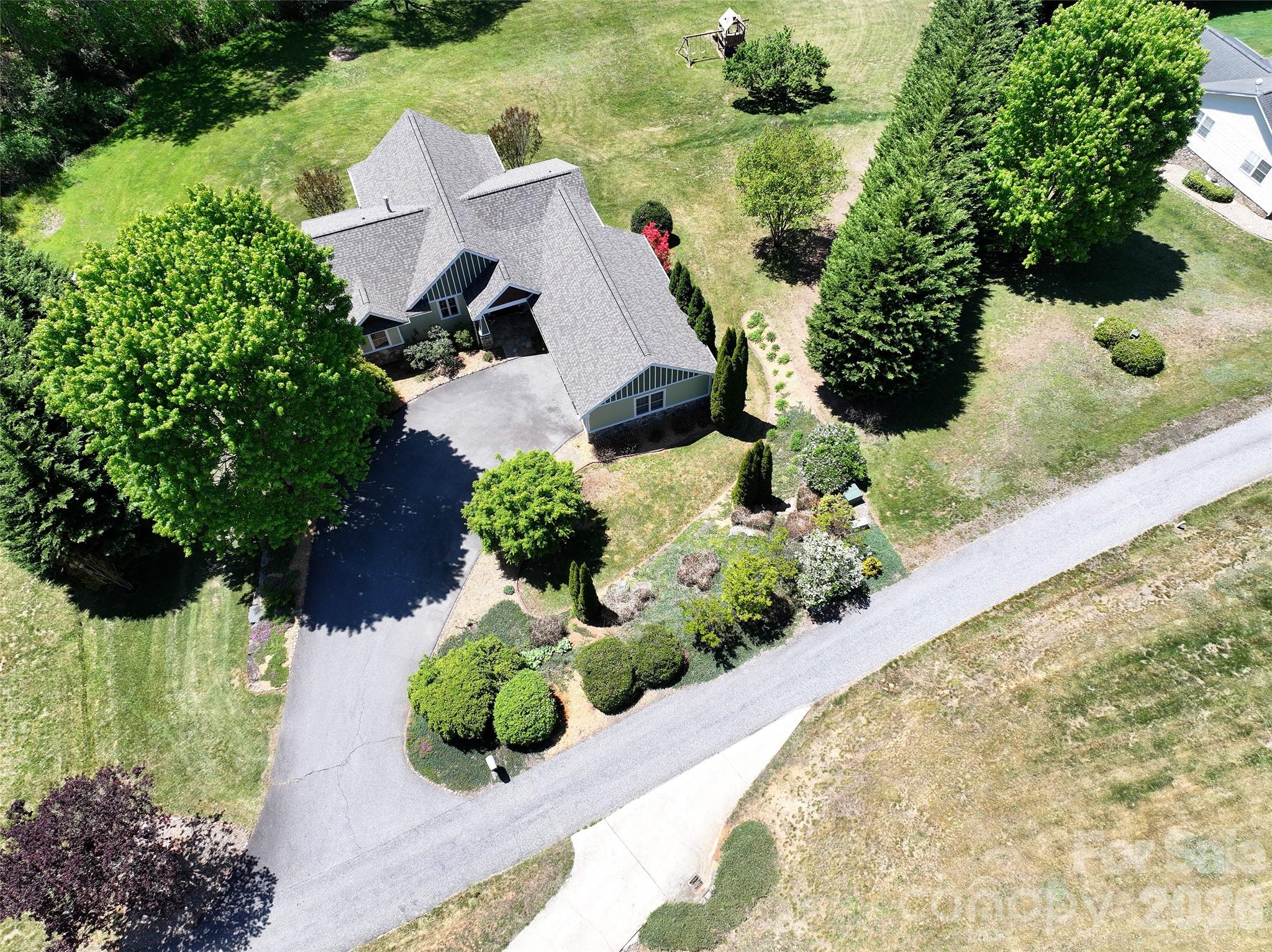 136 Mystic Way Canton, NC 28716 - Photo 6 of 10 an aerial view of house with yard and outdoor seating