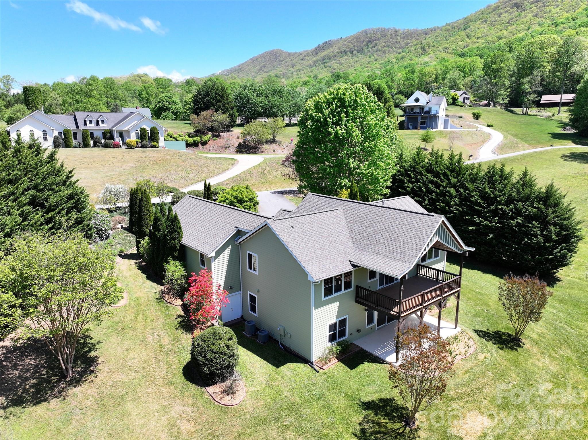 136 Mystic Way Canton, NC 28716 - Photo 8 of 10 an aerial view of a house with yard swimming pool and outdoor seating