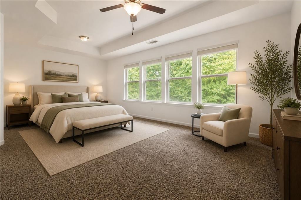 4037 Fireoak Drive Decatur, GA 30032 - Photo 7 of 13 a bedroom with a bed and a couch