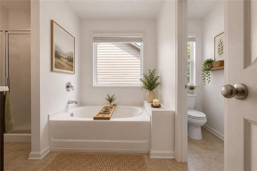 4037 Fireoak Drive Decatur, GA 30032 - Photo 8 of 13 a bath room with a toilet a sink and a bath tub