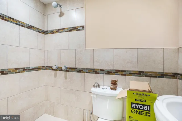 a bathroom with a sink and a shower