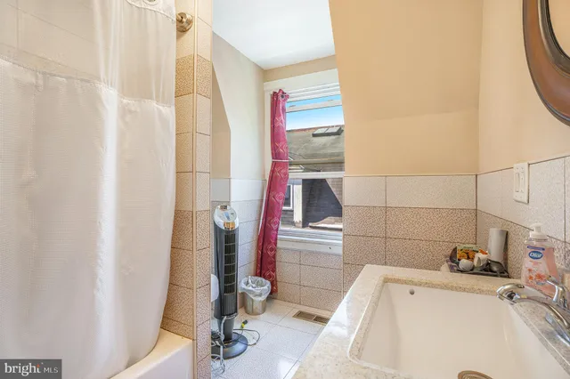 a bathroom with a sink and a tub