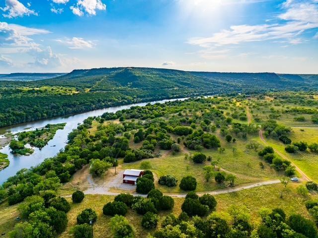 Undisclosed Address Graford, TX 76449 - Photo 3 of 16 a view of a lake with a city