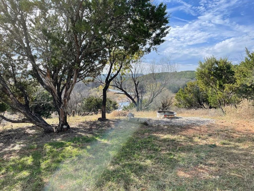 Undisclosed Address Graford, TX 76449 - Photo 7 of 16 a view of outdoor space with trees