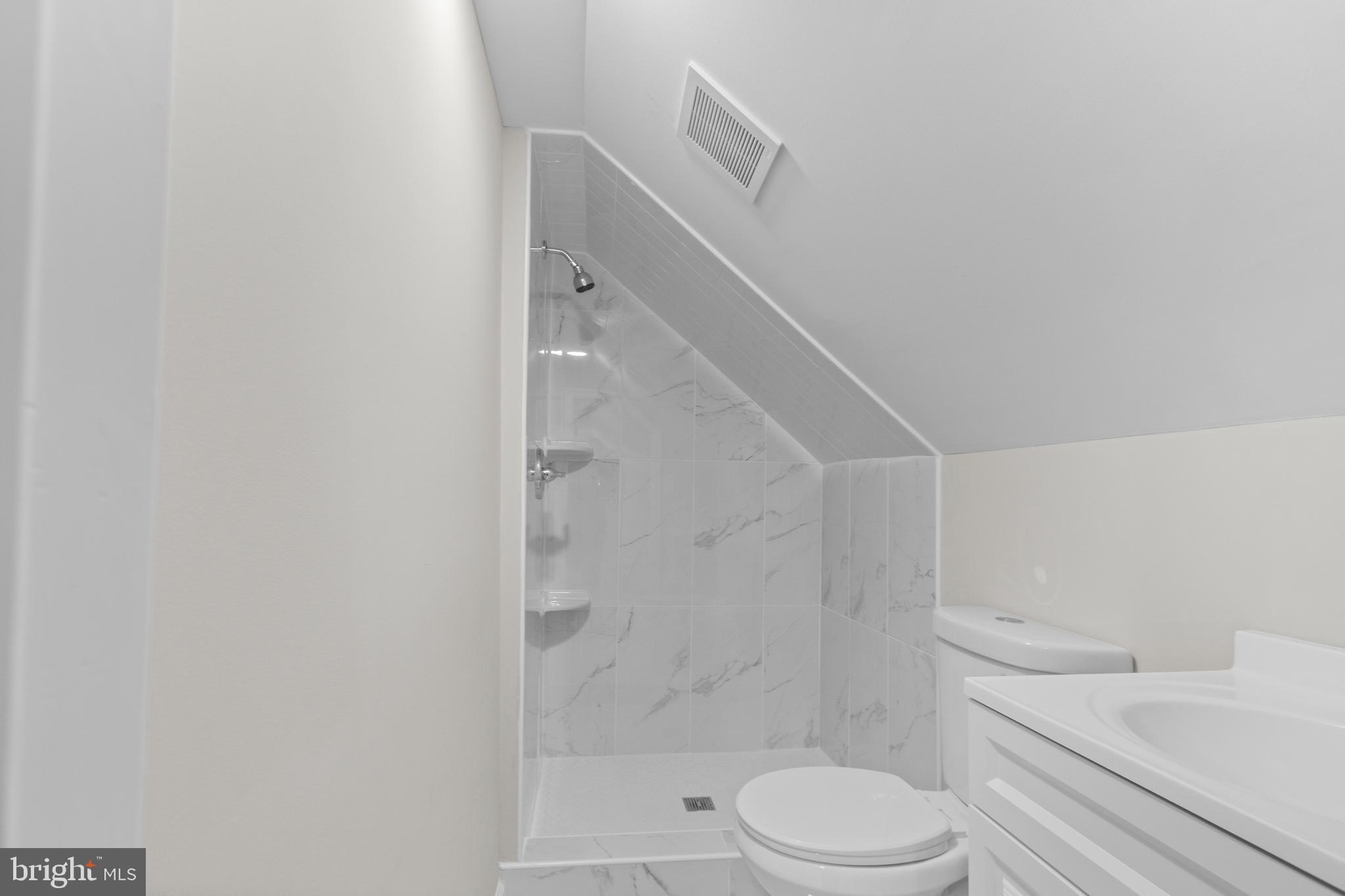 5021 A Street Southeast Washington, DC 20019 - Photo 28 of 43 a bathroom with a toilet and a shower