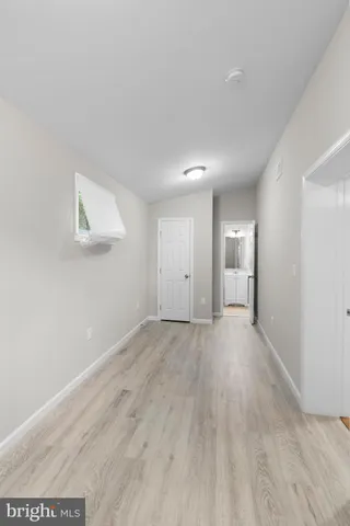 a view of an empty room and window