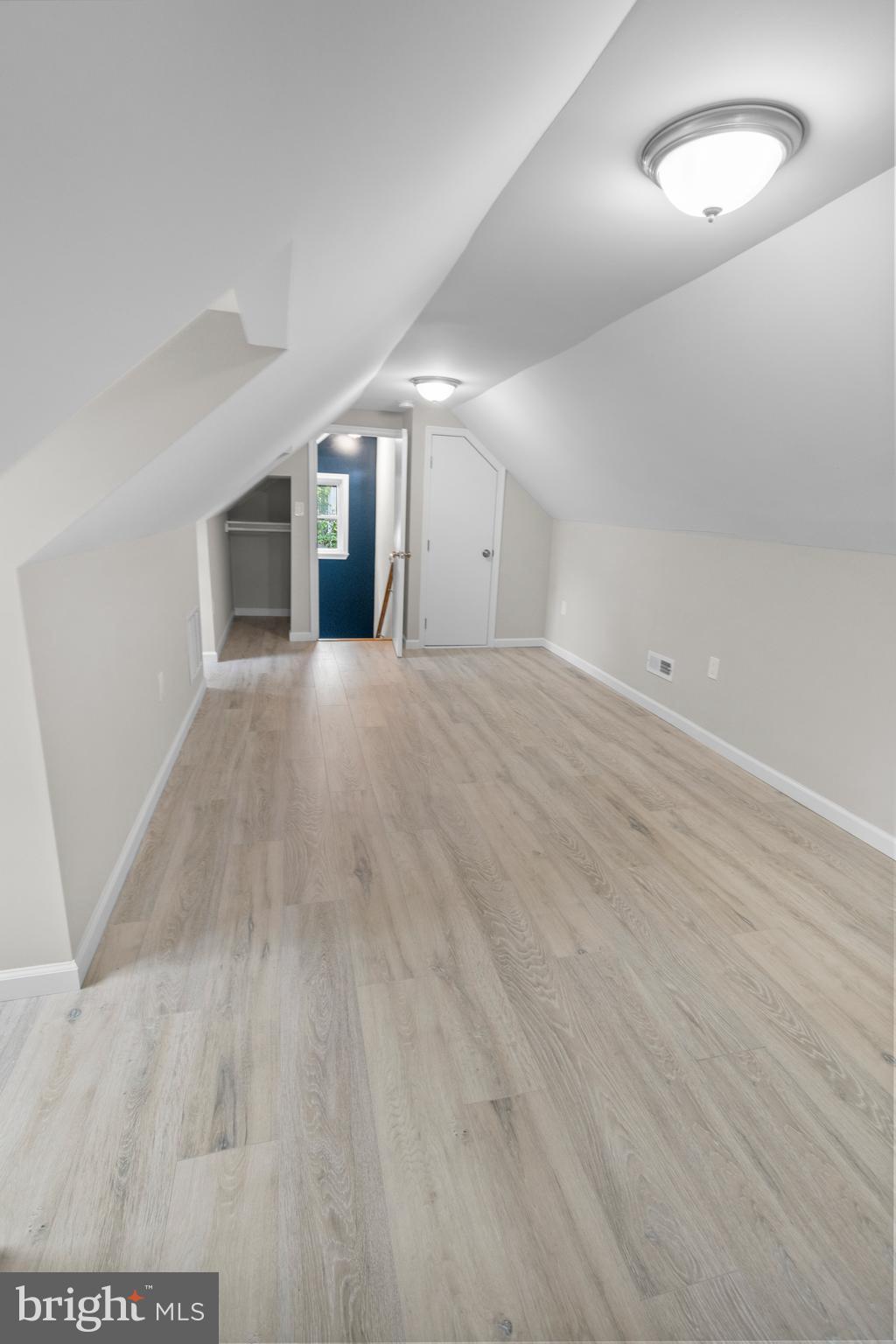 5021 A Street Southeast Washington, DC 20019 - Photo 30 of 43 an empty room with wooden floor and windows