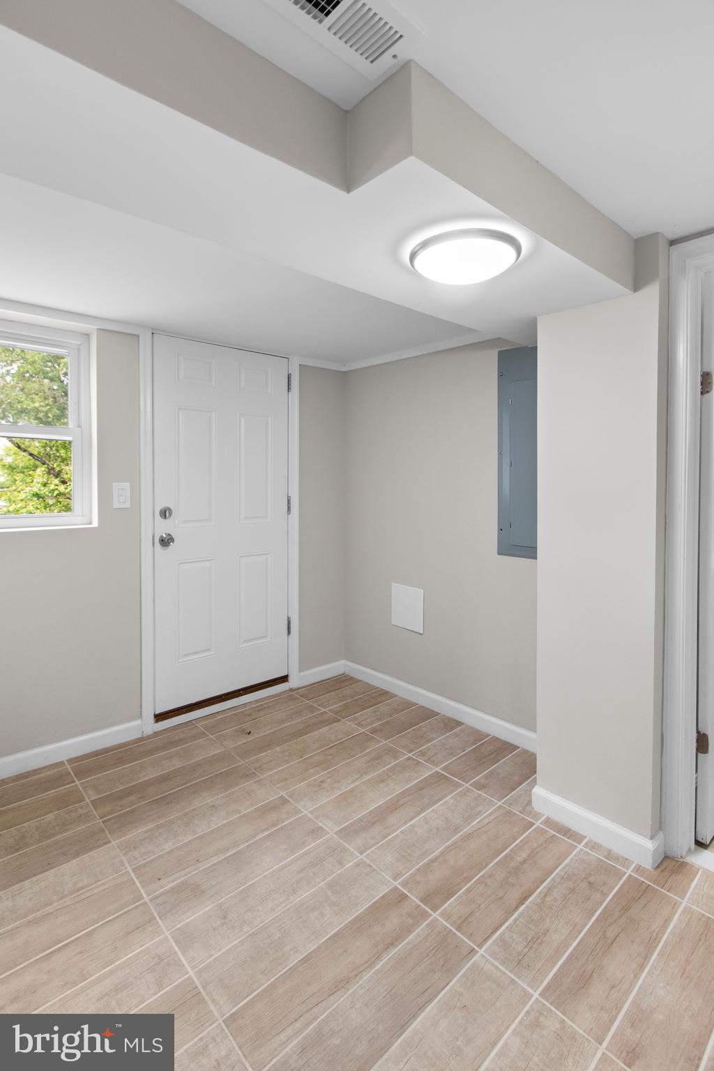 5021 A Street Southeast Washington, DC 20019 - Photo 41 of 43 an empty room with windows