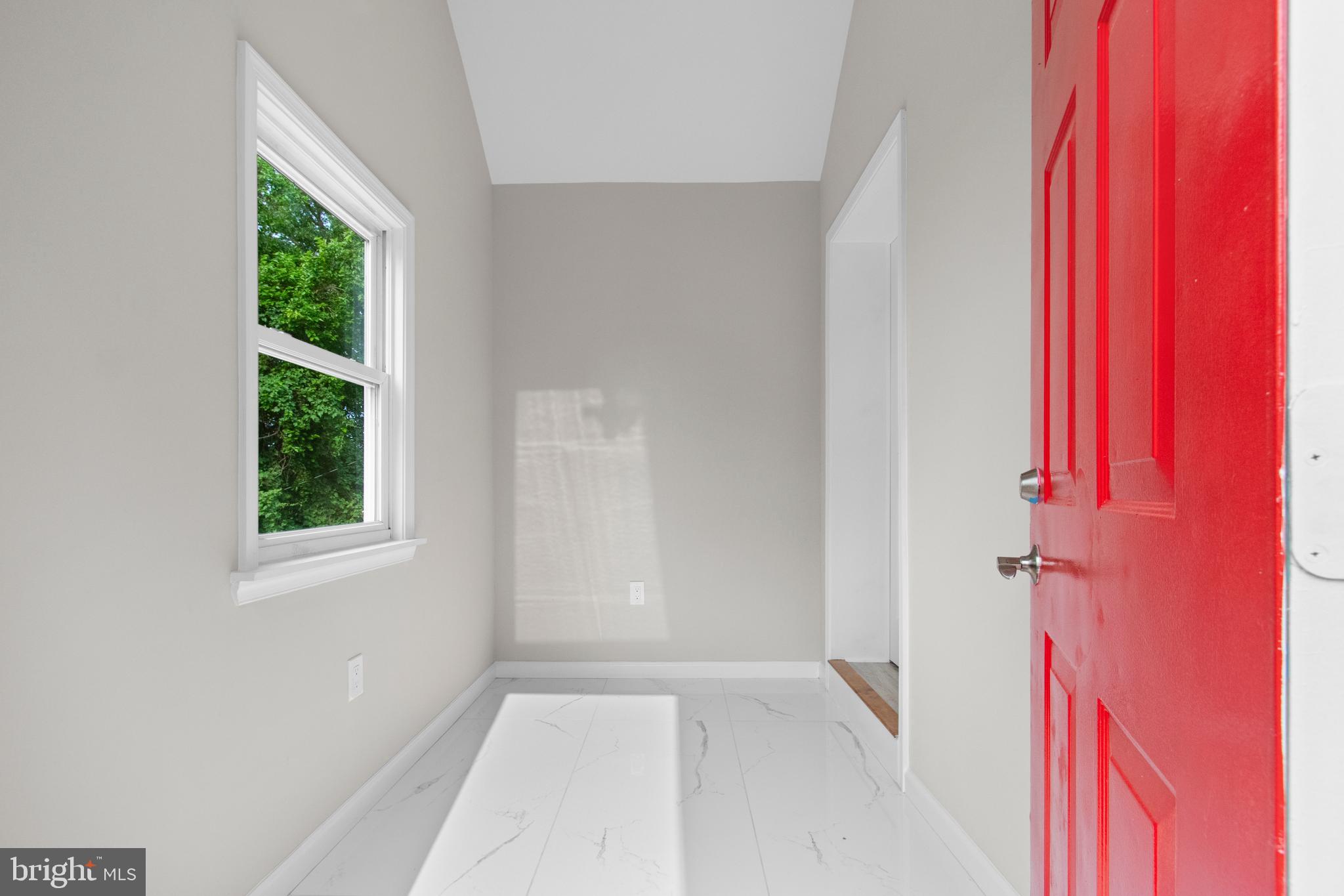 5021 A Street Southeast Washington, DC 20019 - Photo 8 of 43 an empty room with windows