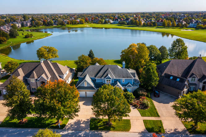 3643 White Eagle Drive Naperville, IL 60564 - Photo 1 of 1 an aerial view of a house with a swimming pool yard and outdoor seating
