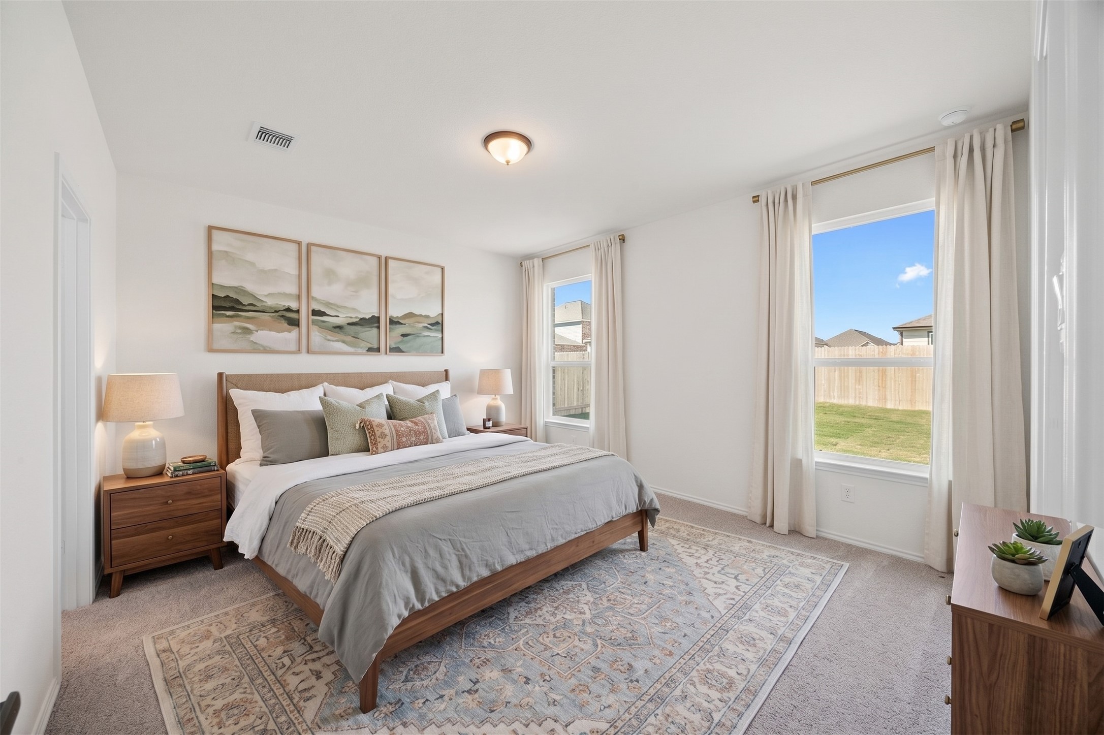 15100 Garrano Way Manor, TX 78653 - Photo 19 of 34 **Virtually Staged Photo of Primary Bedroom**