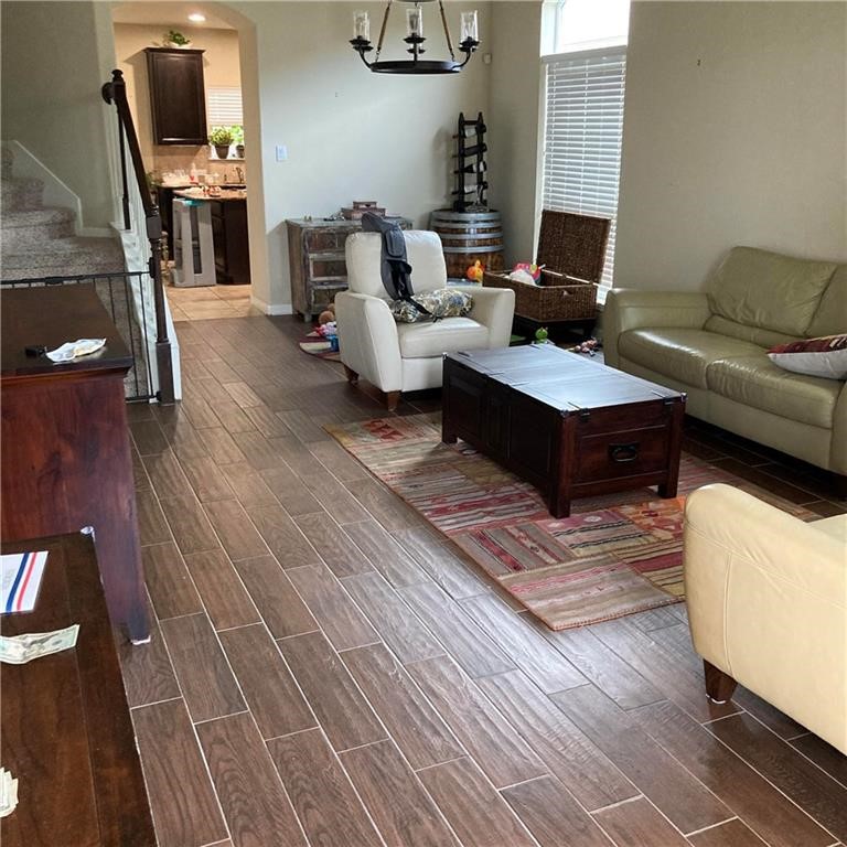 8508 Inca Dove Drive Austin, TX 78729 - Photo 6 of 22 a living room with furniture and a fireplace