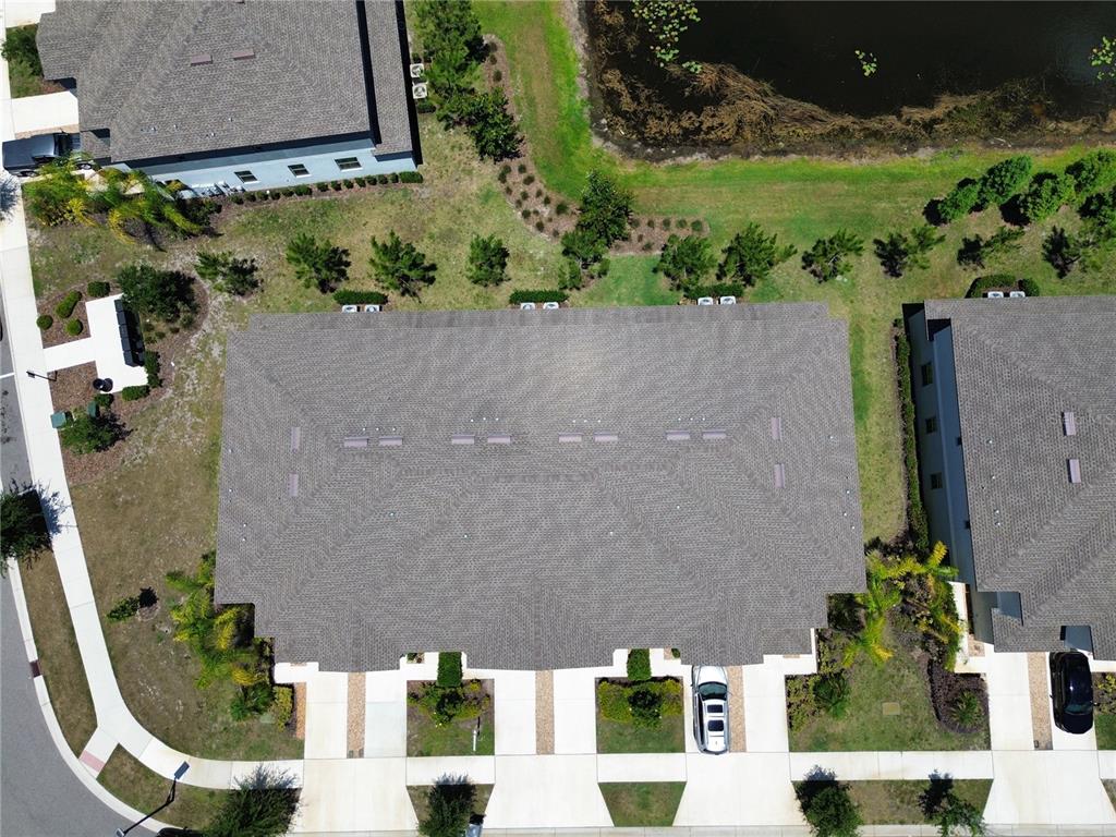 11826 Dumaine Valley Road Riverview, FL 33579 - Photo 40 of 54 an aerial view of a house with a yard