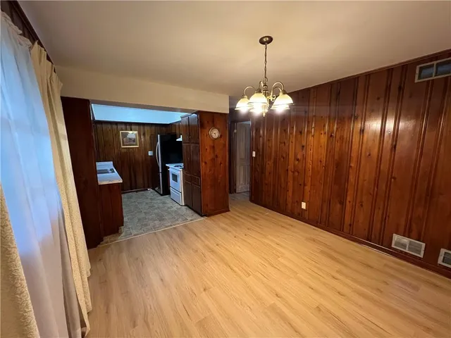 a view of a livingroom with a furniture