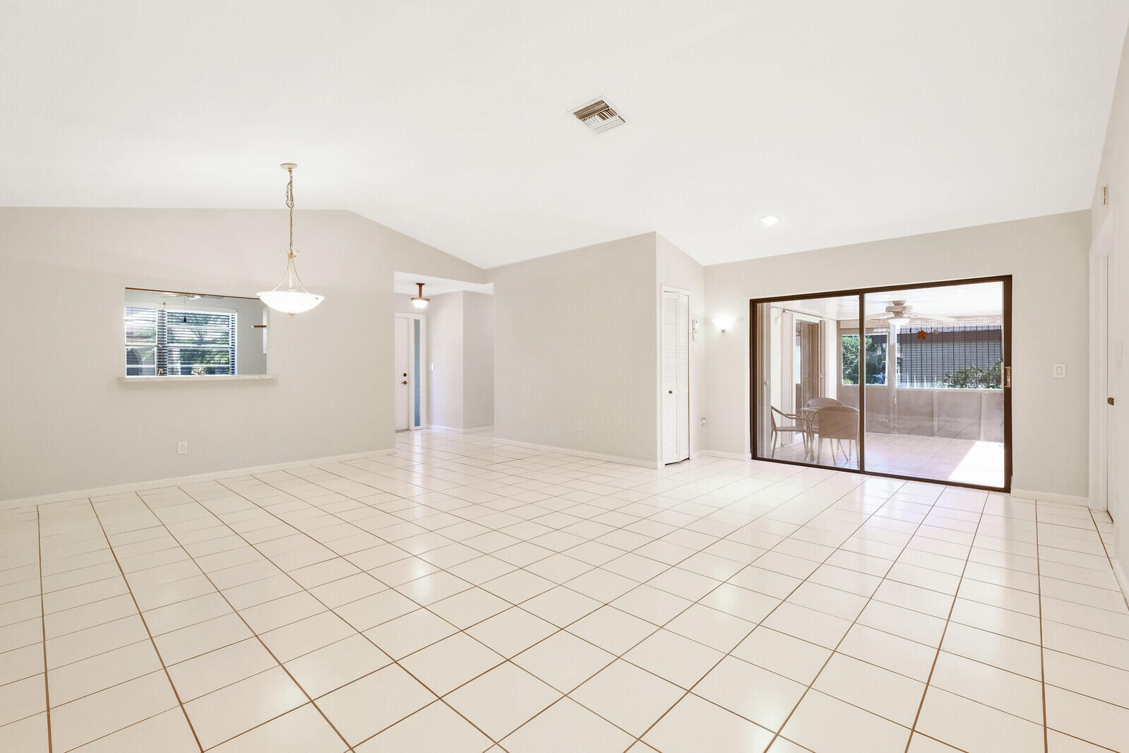 23433 Barlake Drive Boca Raton, FL 33433 - Photo 5 of 21 Living Room & Dinning Room w/ Patio View