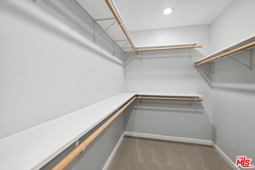 10351 Wilshire Boulevard, Unit PH1 Los Angeles, CA 90024 - Photo 15 of 23 a view of an empty walk in closet
