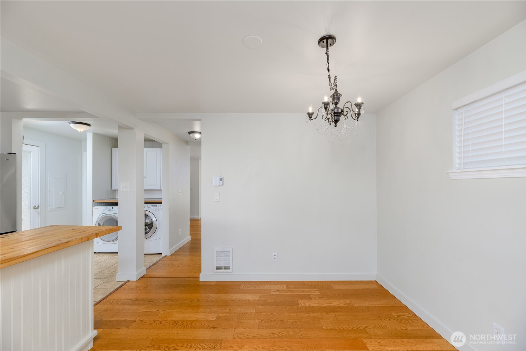 131 Alpine Loop Sequim, WA 98382 - Photo 19 of 40 a view of a livingroom with wooden floor and a ceiling fan