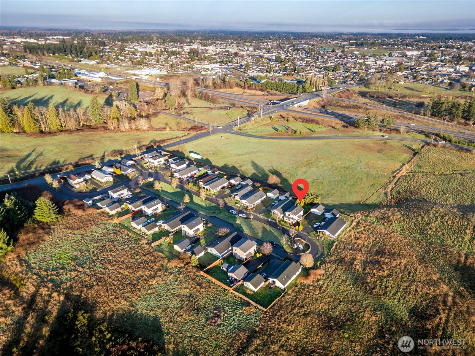 131 Alpine Loop Sequim, WA 98382 - Photo 3 of 40 an aerial view of residential houses with outdoor space