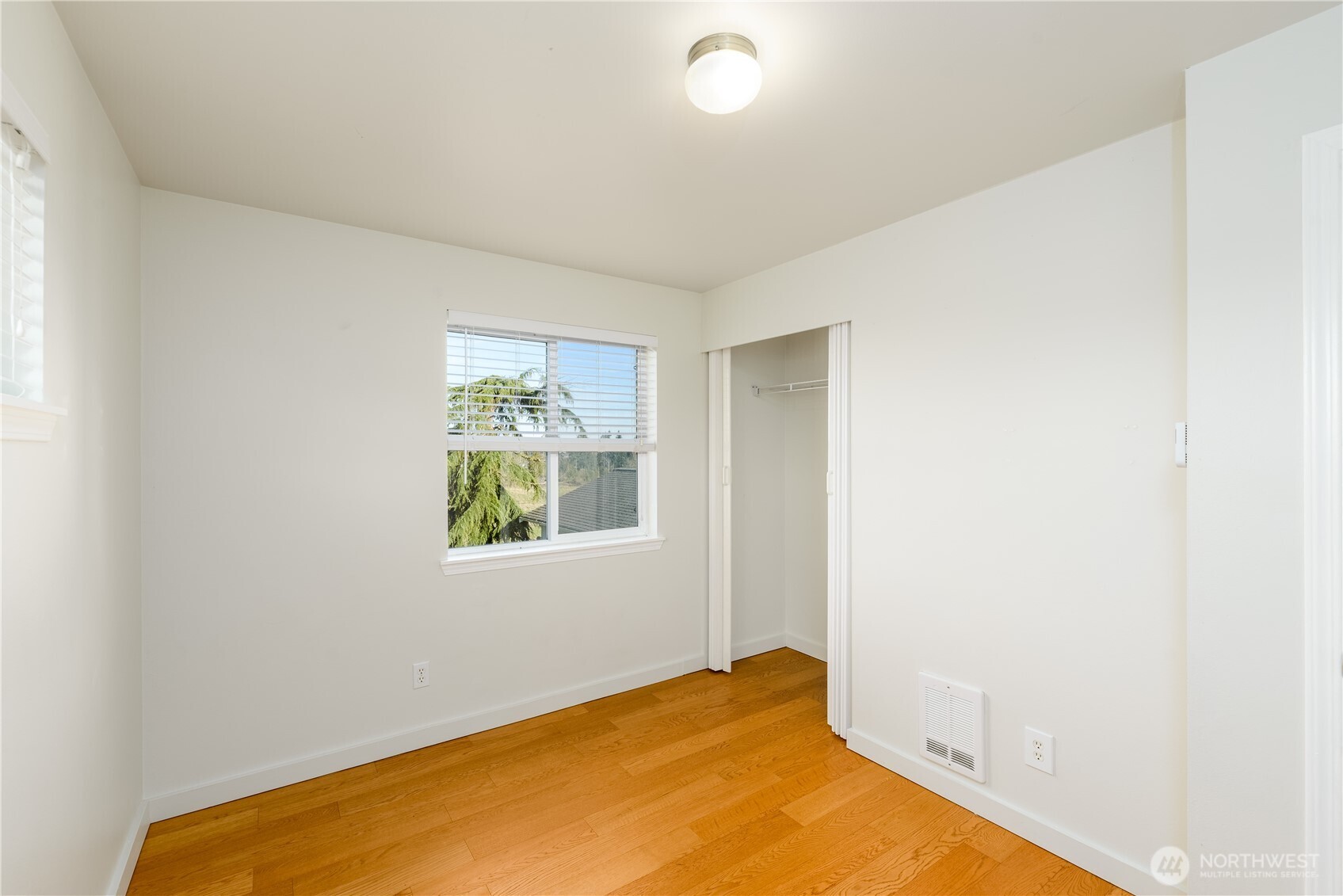 131 Alpine Loop Sequim, WA 98382 - Photo 31 of 40 a view of a bedroom with window