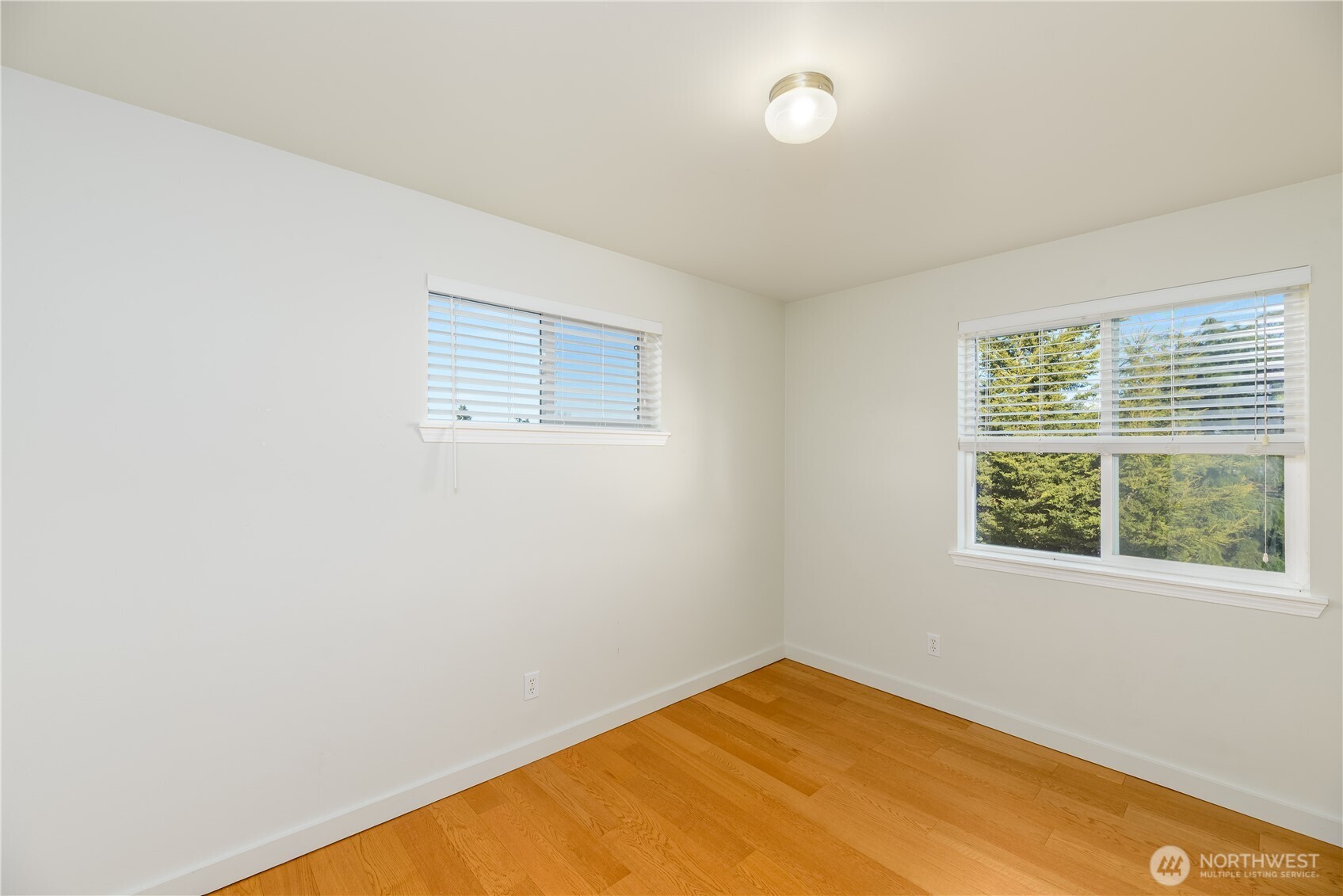 131 Alpine Loop Sequim, WA 98382 - Photo 32 of 40 an empty room with a window