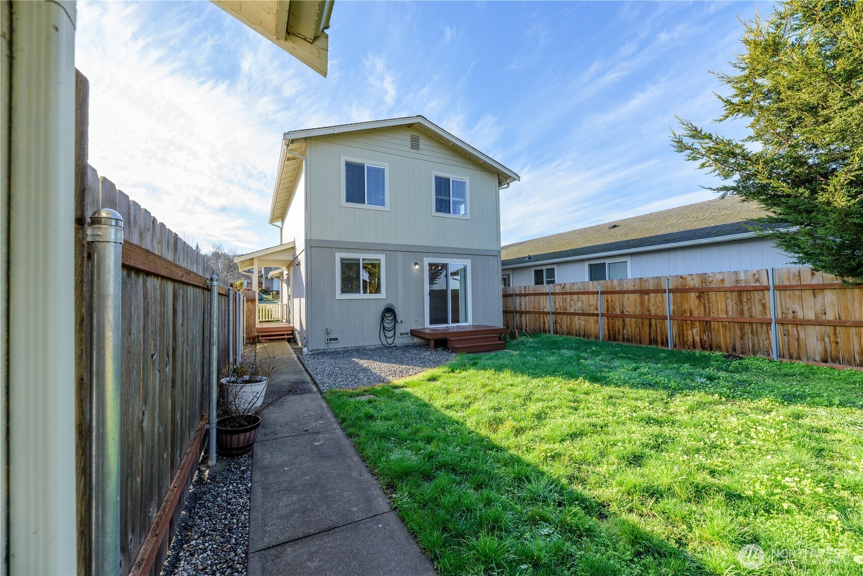 131 Alpine Loop Sequim, WA 98382 - Photo 34 of 40 a view of a house with backyard and porch