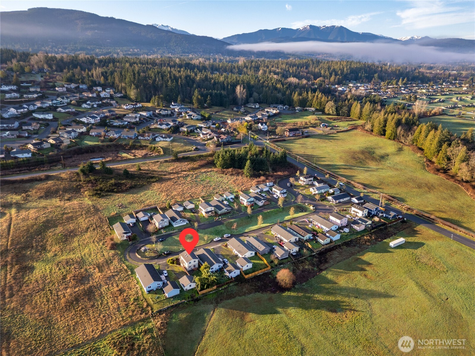 131 Alpine Loop Sequim, WA 98382 - Photo 4 of 40 a view of a city with ocean