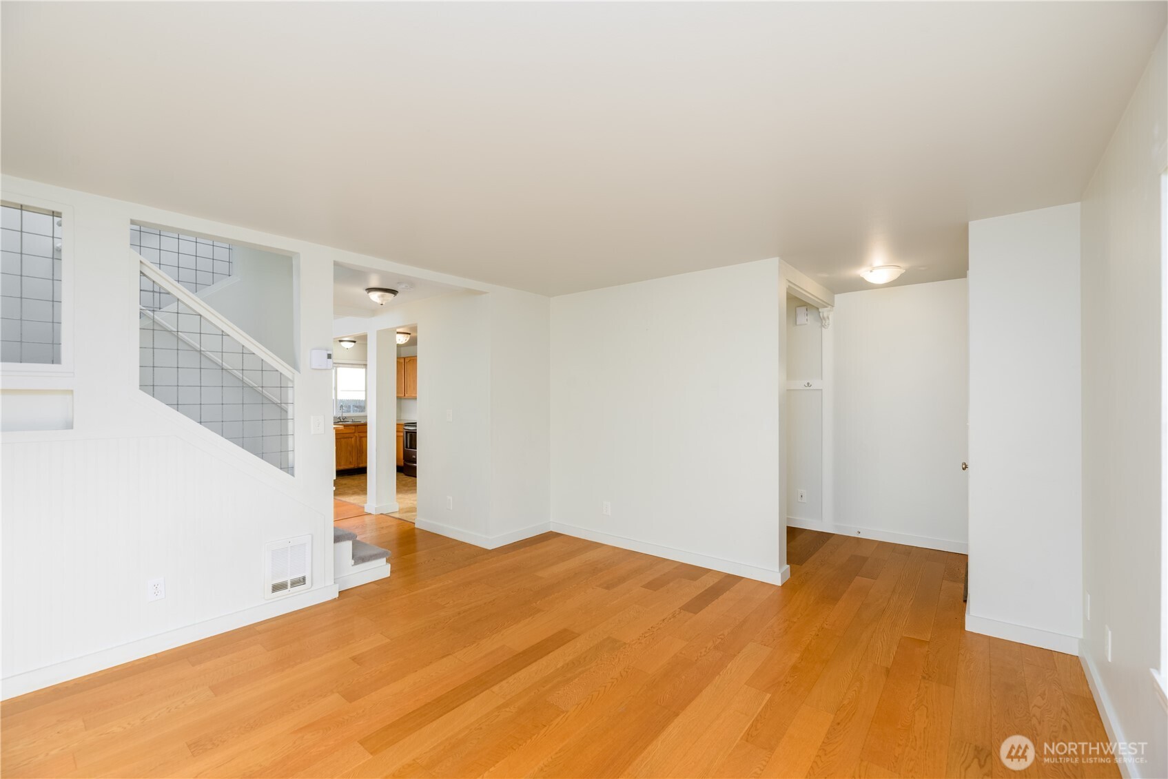131 Alpine Loop Sequim, WA 98382 - Photo 7 of 40 a view of a big room with closet and wooden floor