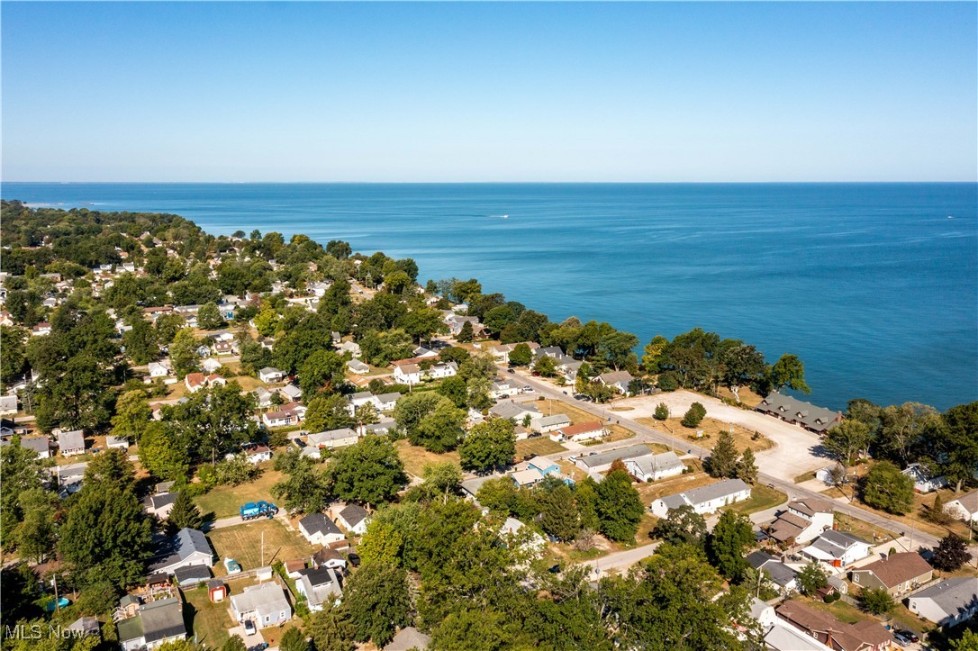 230 Devonshire Road Vermilion, OH 44089 - Photo 7 of 16 Drone / aerial view featuring a water view