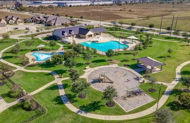 an aerial view of a house with outdoor space