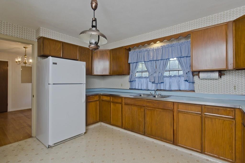 48 Collingwood Road Springfield, MA 01119 - Photo 8 of 27 a kitchen with stainless steel appliances granite countertop a refrigerator a sink and dishwasher