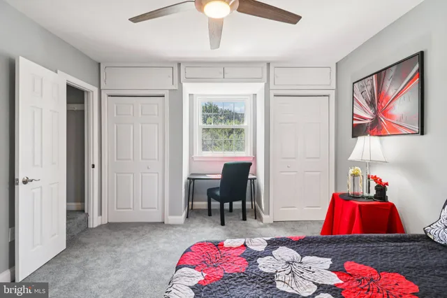 a living room with furniture rug and window