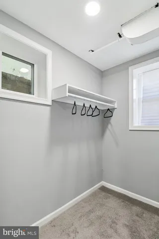 a view of a room with rack on the wall