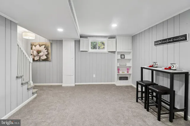 a view of a livingroom with furniture and window