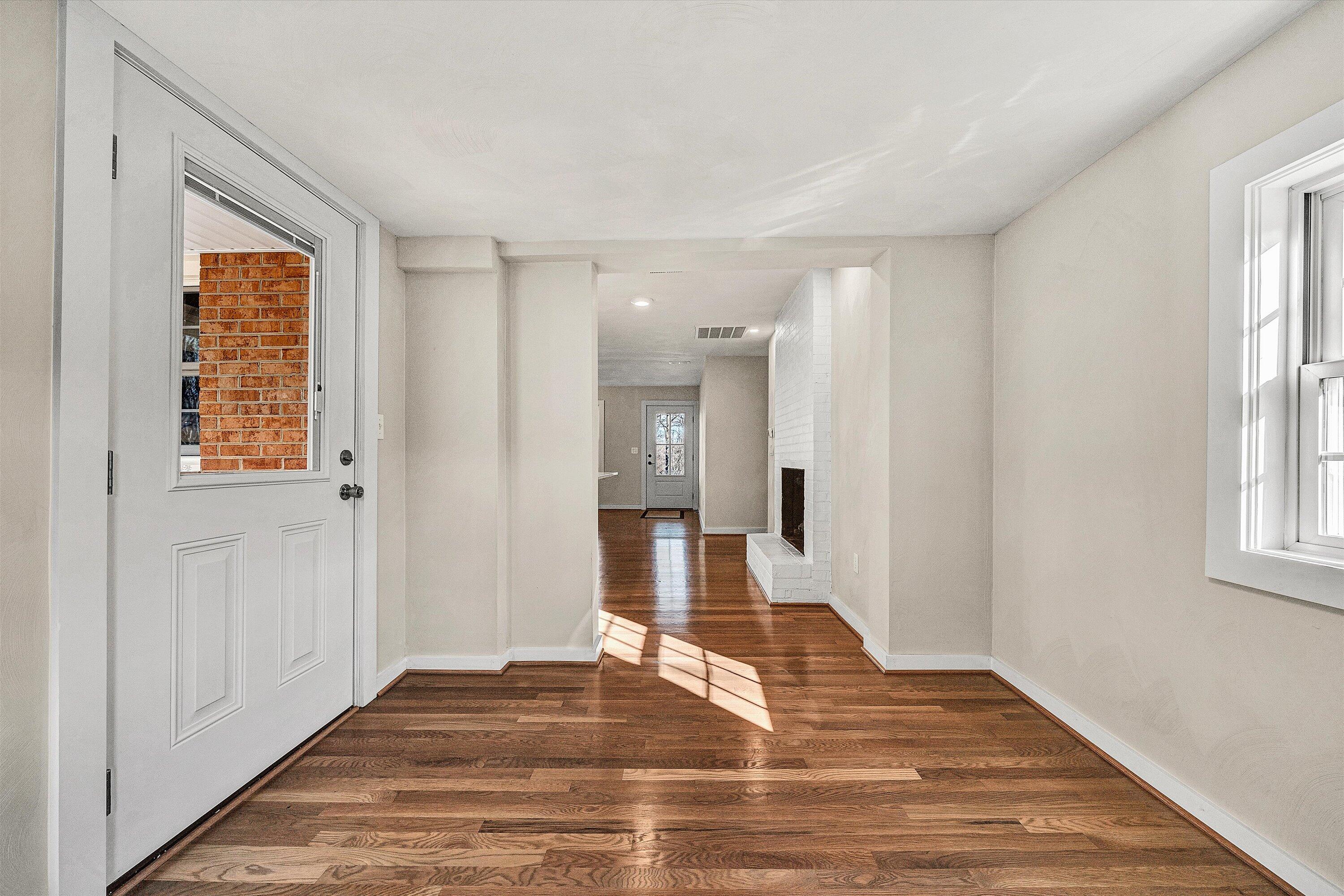 4883 Edwardsville Road Hardy, VA 24101 - Photo 12 of 32 a view of a room with wooden floor and windows
