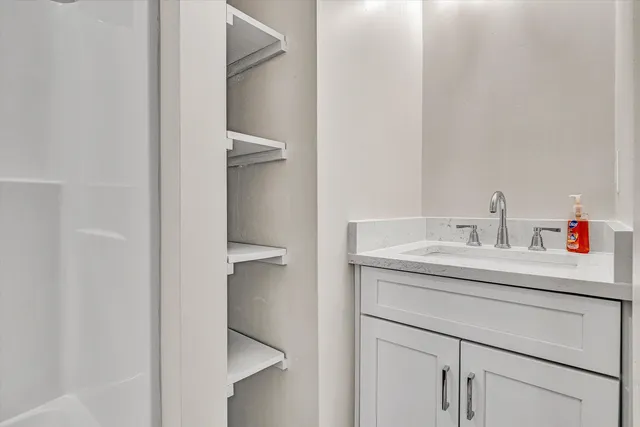 a bathroom with a sink and a vanity