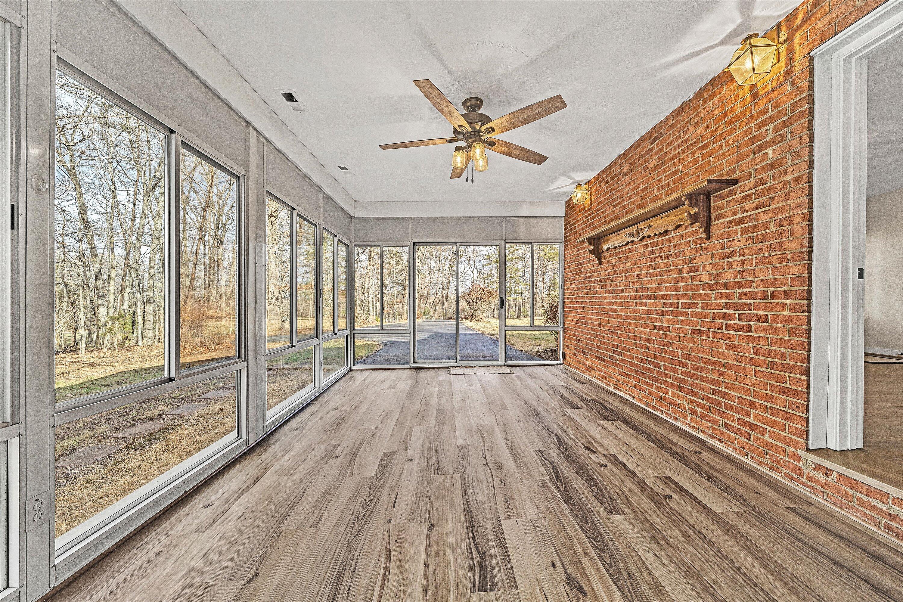 4883 Edwardsville Road Hardy, VA 24101 - Photo 22 of 32 a view of outdoor space with wooden floor and windows