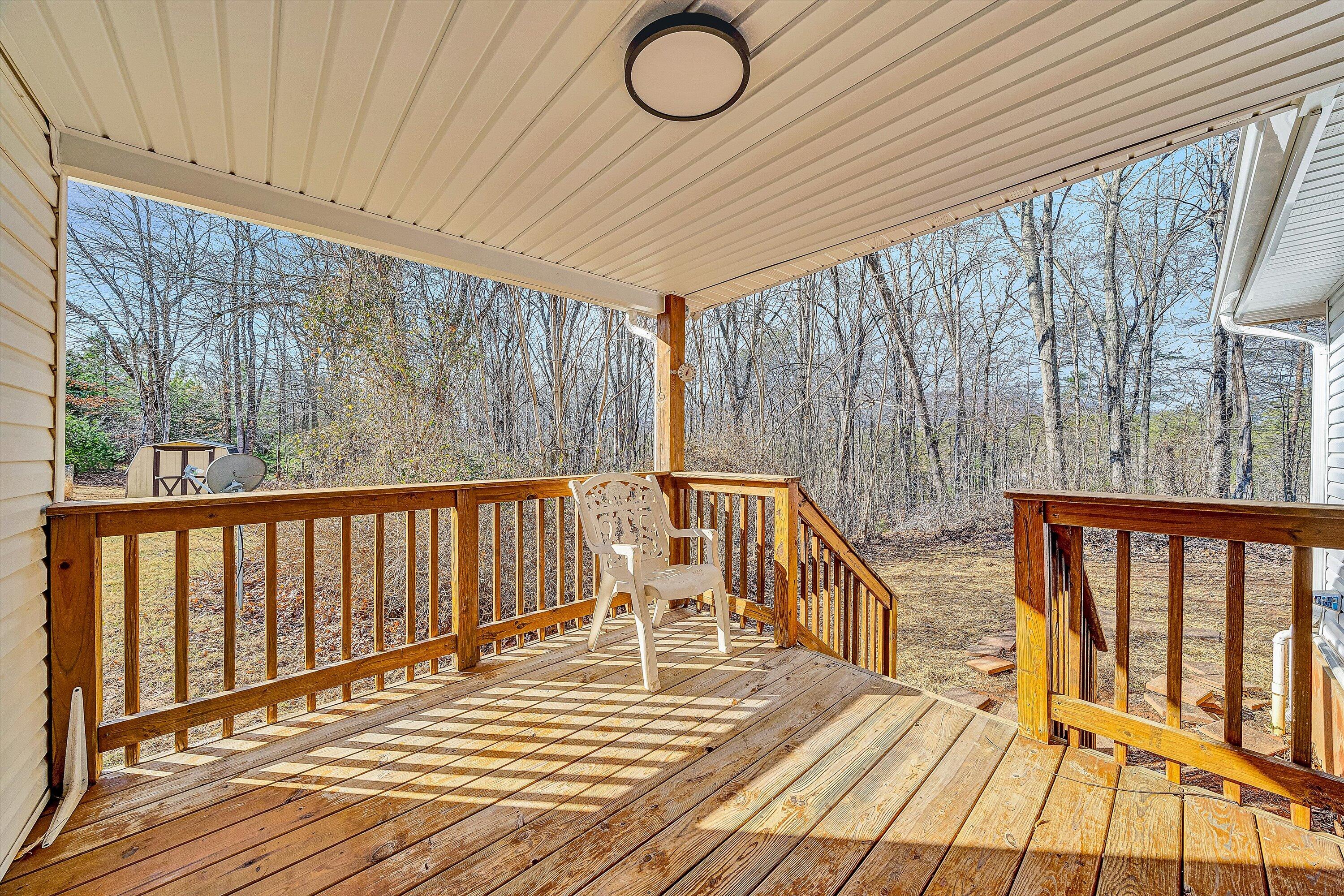 4883 Edwardsville Road Hardy, VA 24101 - Photo 26 of 32 a view of balcony with wooden floor and fence