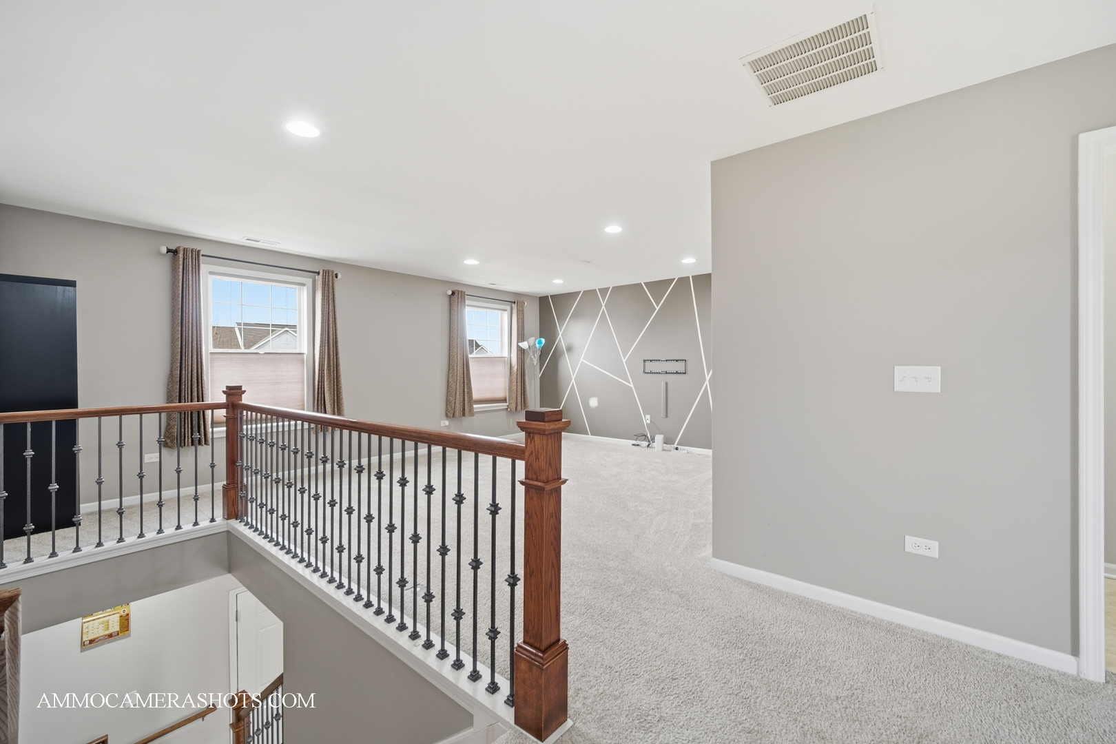 4308 Fraser Circle Naperville, IL 60564 - Photo 20 of 43 a view of a hallway with windows and stairs