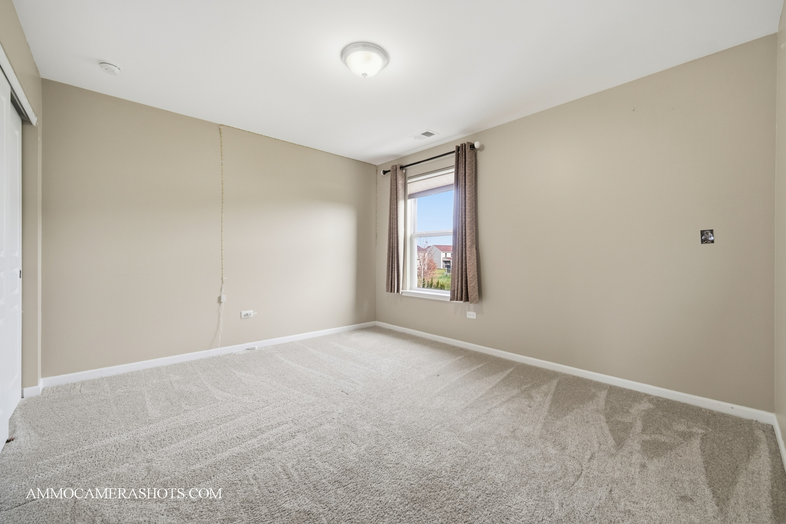 4308 Fraser Circle Naperville, IL 60564 - Photo 22 of 43 a view of an empty room with windows
