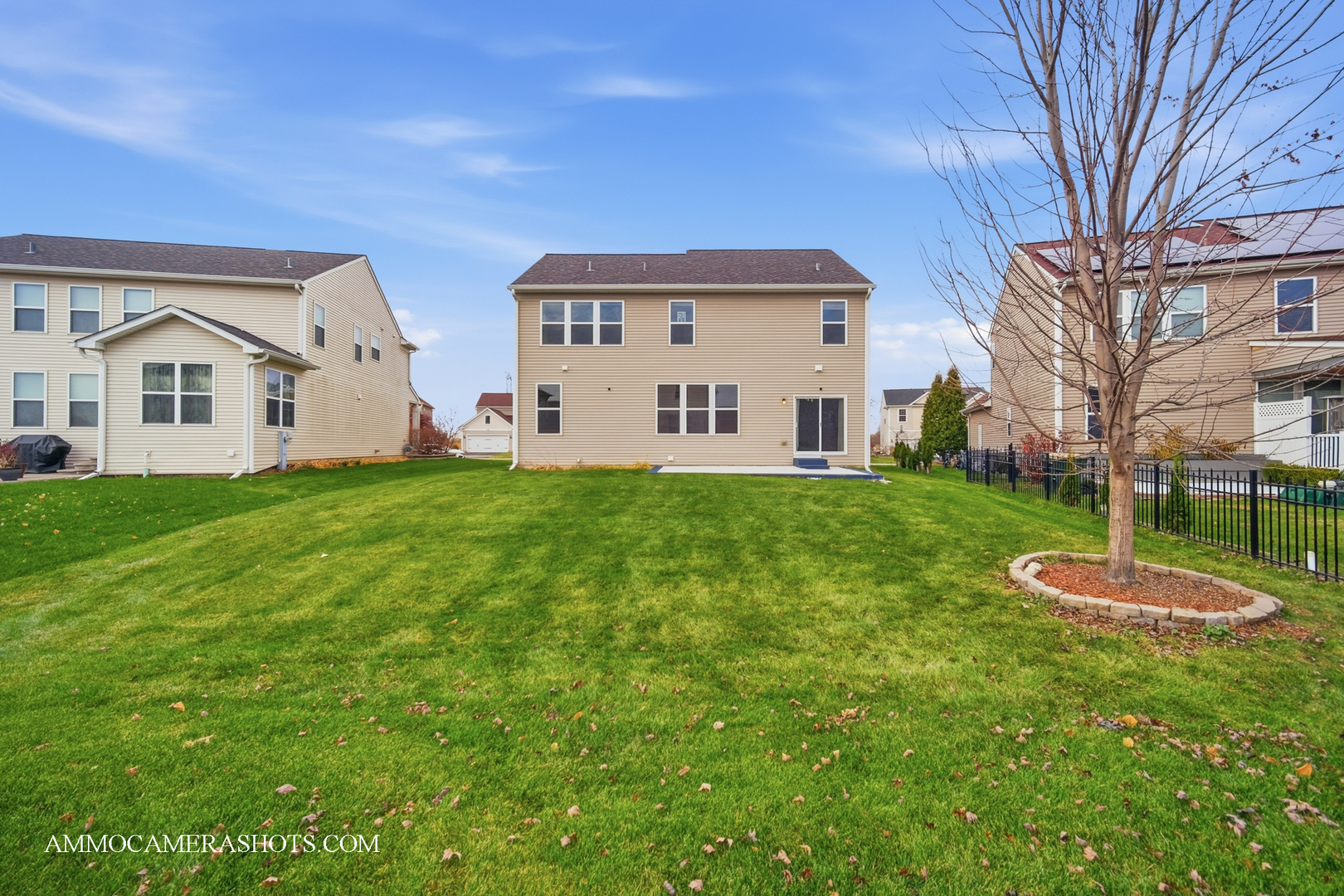 4308 Fraser Circle Naperville, IL 60564 - Photo 42 of 43 a view of a house with a yard and sitting area
