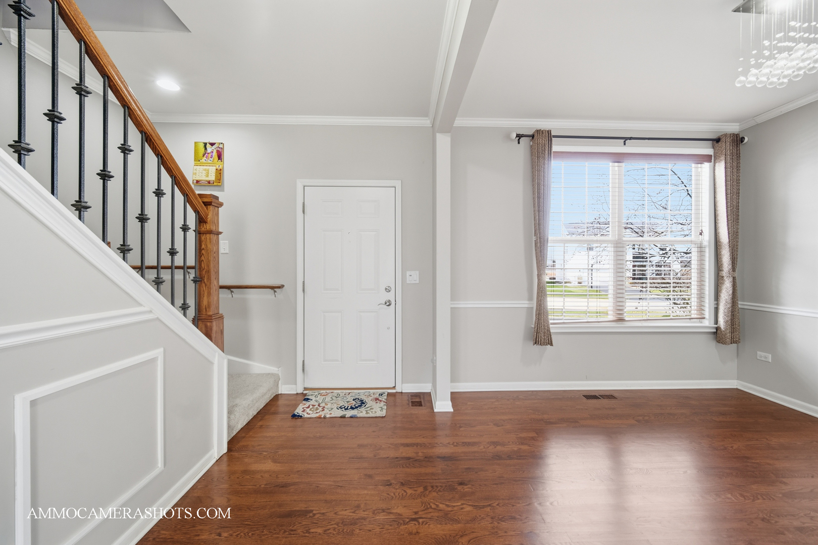 4308 Fraser Circle Naperville, IL 60564 - Photo 6 of 43 a view of an entryway with wooden floor and door